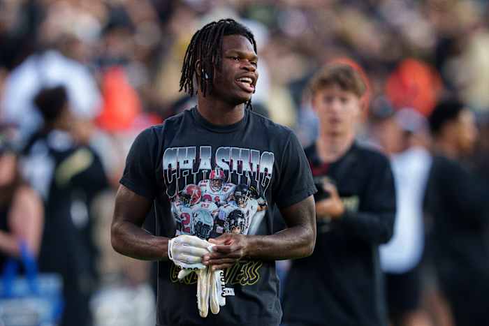 Colorado Buffaloes cornerback Travis Hunter (12) warms up prior to the game against the Colorado State Rams at Folsom Field